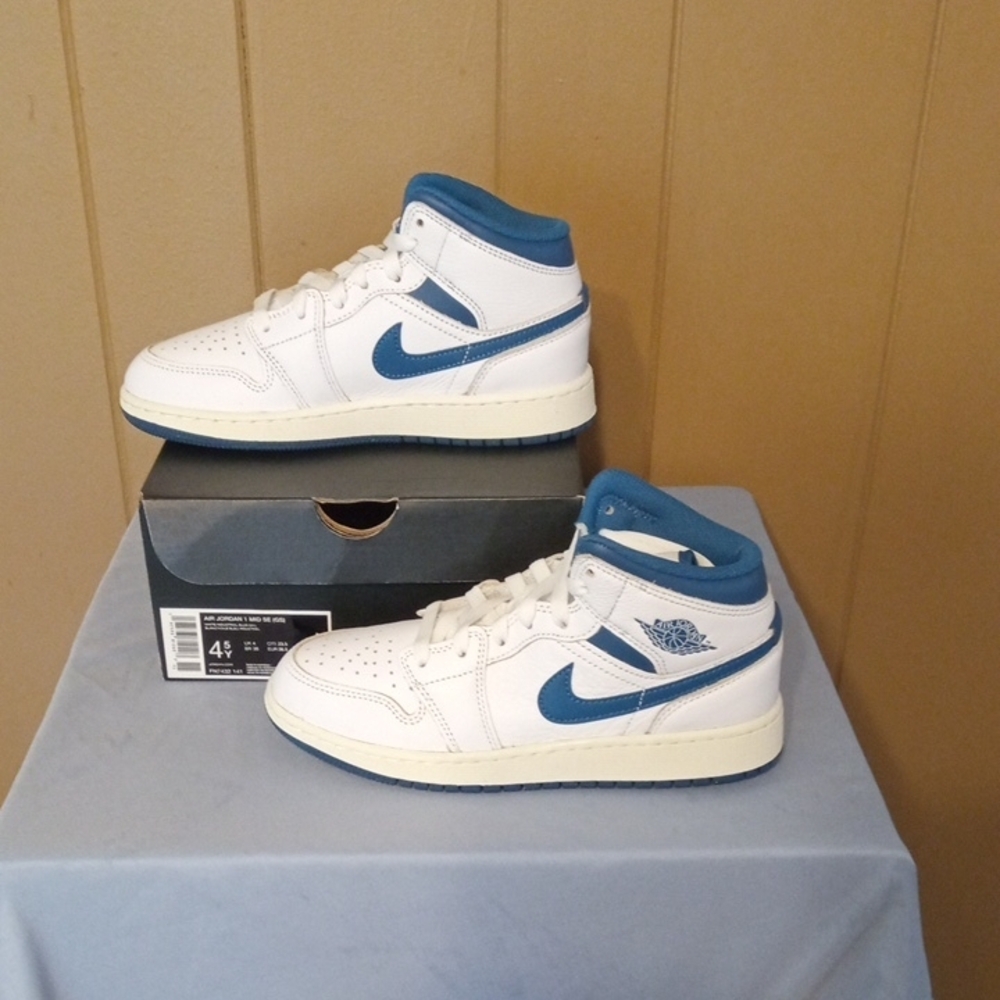 Air Jordan 1 Mid White and Blue Sneakers
